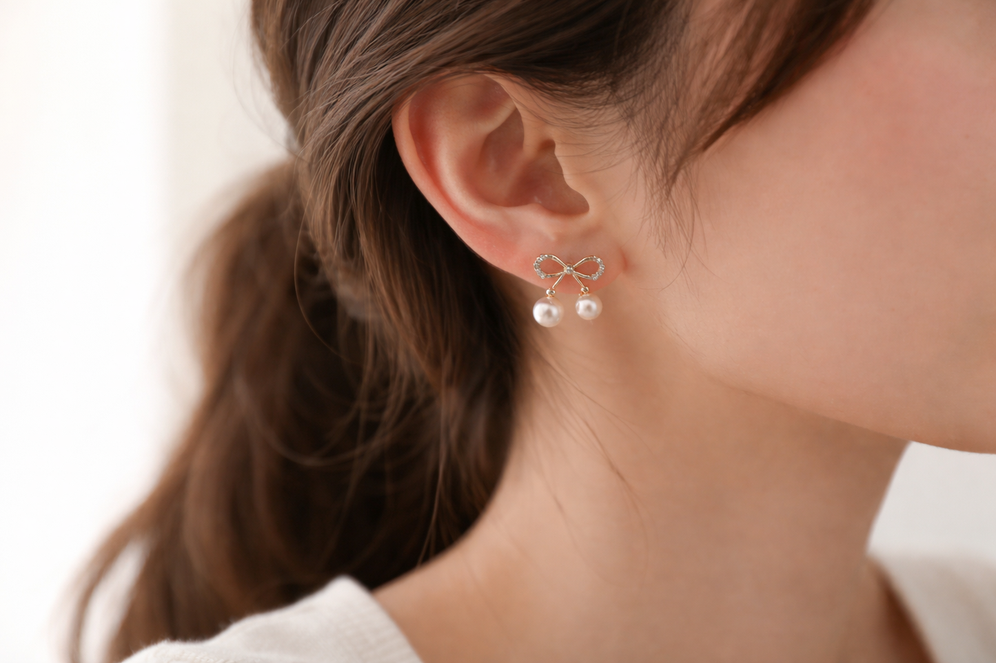 Bow Pearl Stud Earrings