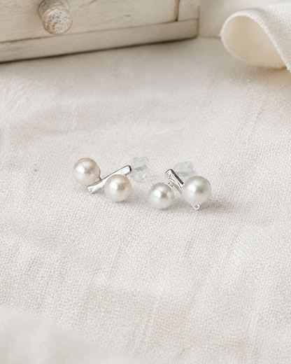 Parallel Pearl Bar Studs — 4:5 styled product photograph