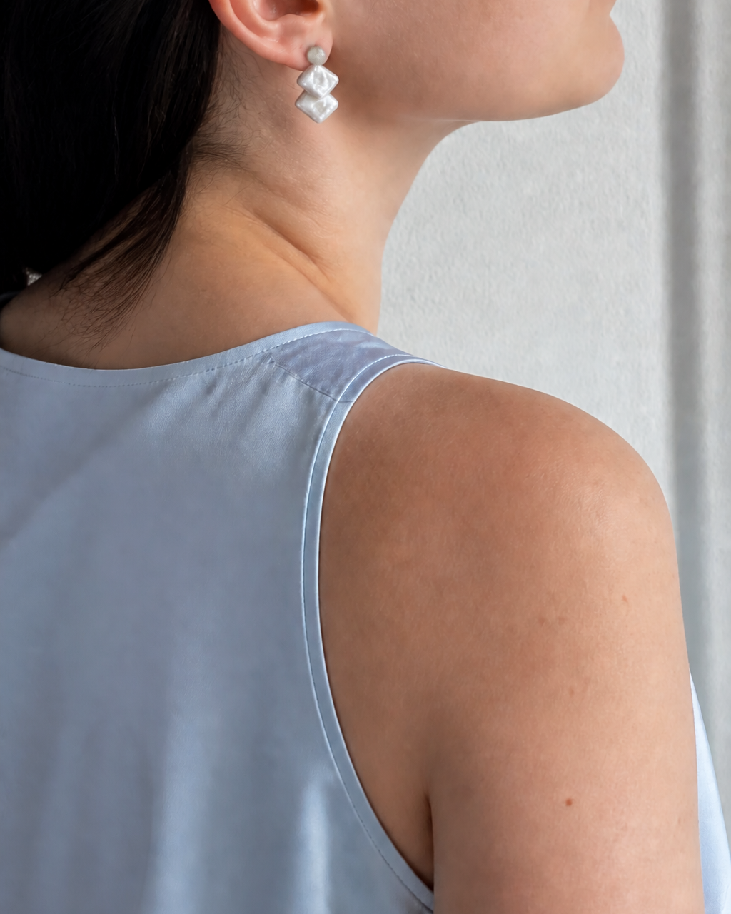 Cascade Keshi Pearl Stud Earrings — 4:5 try-on photograph