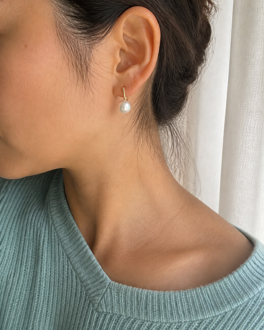 Golden Arc Pearl Drop Earrings — 4:5 try-on photograph