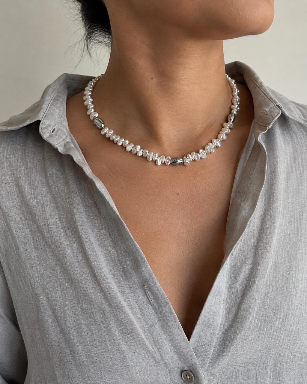 Steel Current Deep Blue Freshwater Pearl Necklace — worn by model