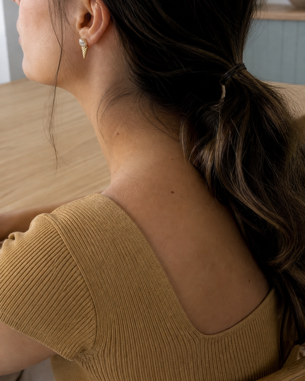 Tidepoint Baroque Pearl Studs — 4:5 try-on photograph