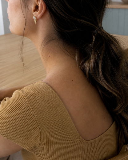 Tidepoint Baroque Pearl Studs — 4:5 try-on photograph